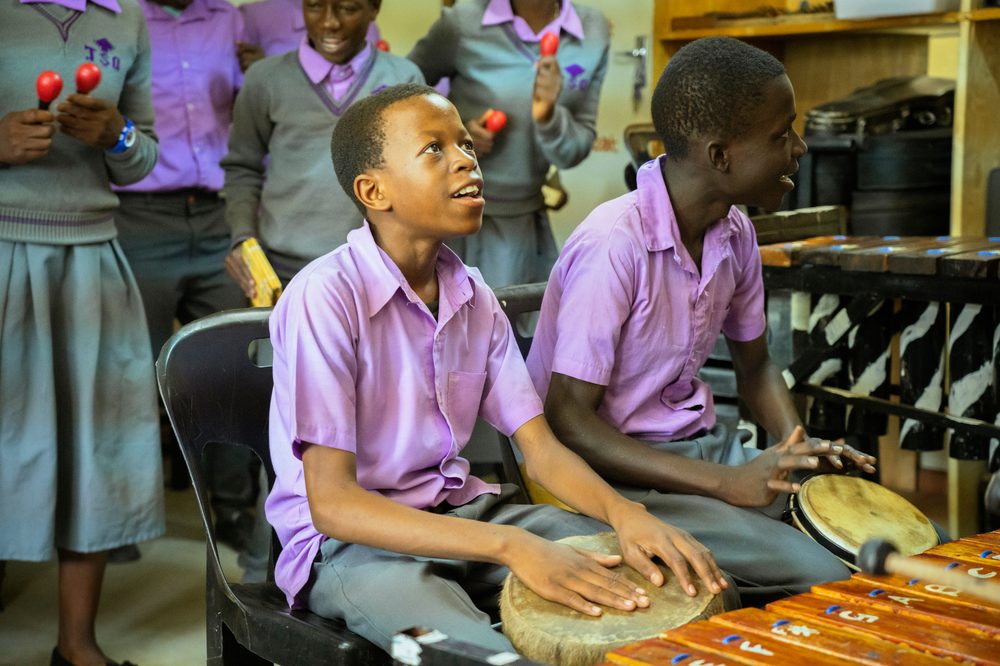 Children playing music together